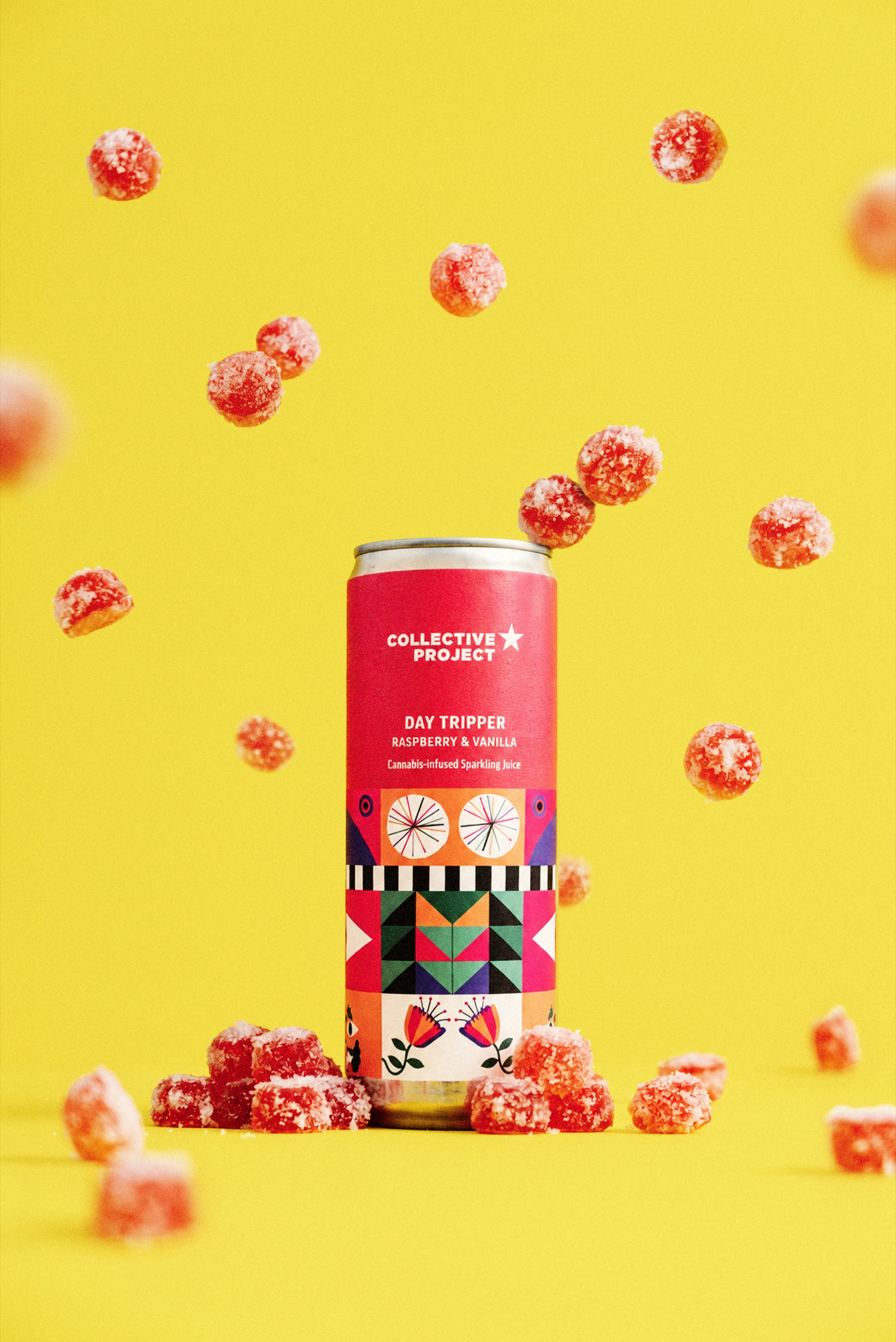 A Collective Project Day Tripper raspberry and vanilla can surrounded by floating Squeezies gummies against yellow.